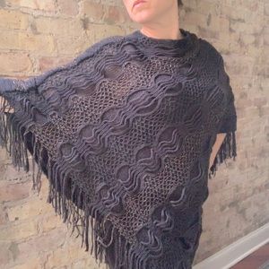 Beautiful boho knit poncho in black and gold